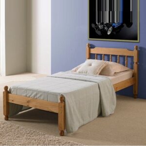 Coleton Spindle Wooden Single Bed In Waxed Pine